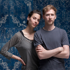 Sarah van Gameren and Tim Simpson stand infront of their Blueware wall piece.